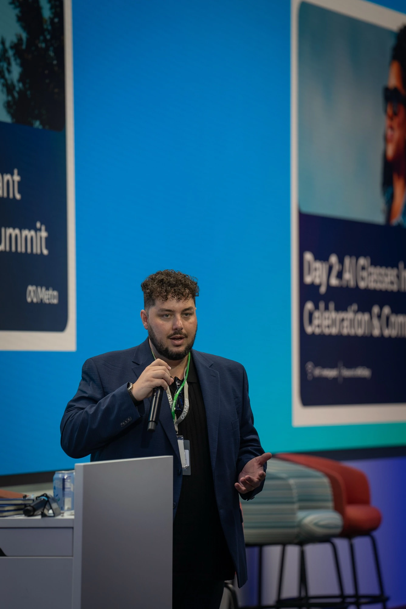 Trust Carbon founder Brayon Pieske speaking with a microphone at the Meta AI Glasses Impact Grant Community Summit